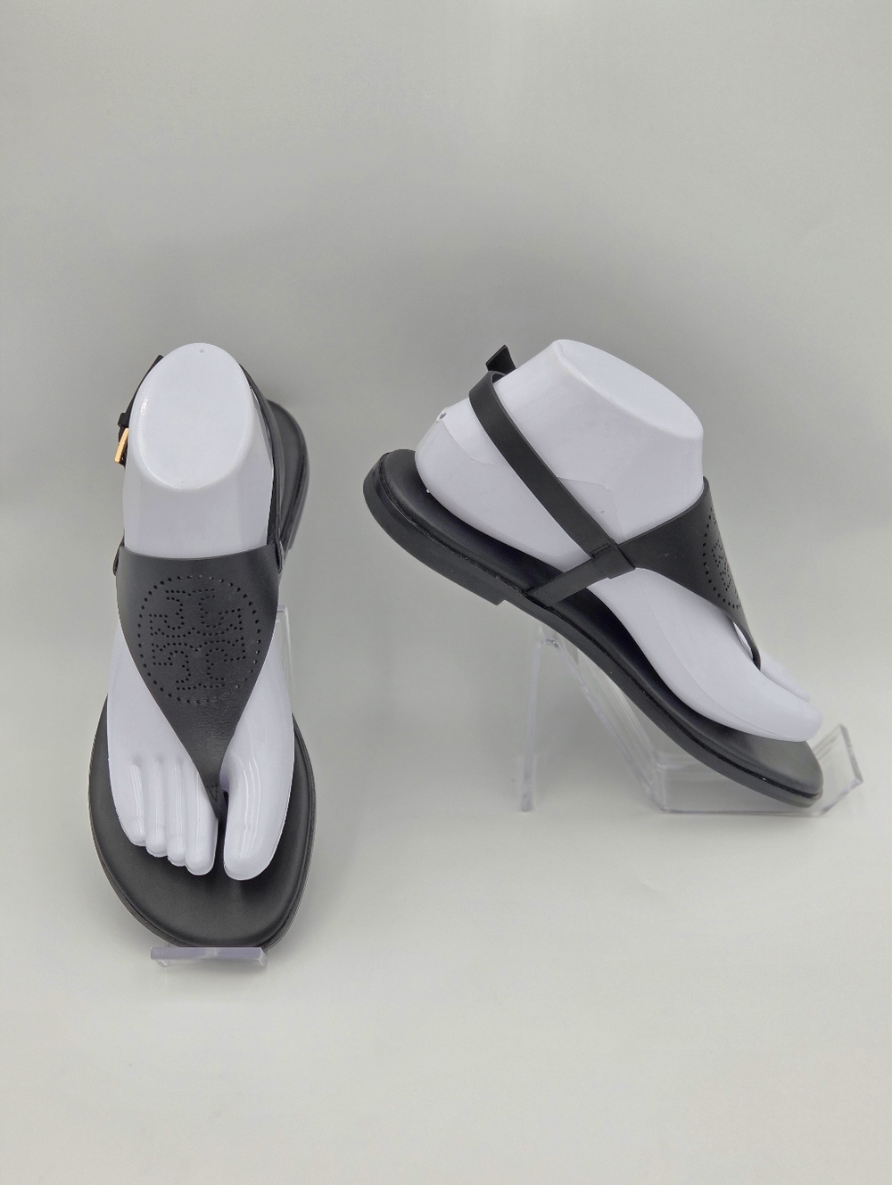 Tory Burch Capri Perforated Logo Leather Thong Sandals in "Perfect Black". 